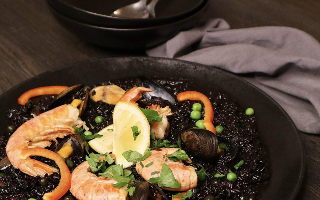 Tipsy Black Paella with a Splash of LAW, the Gin of Ibiza